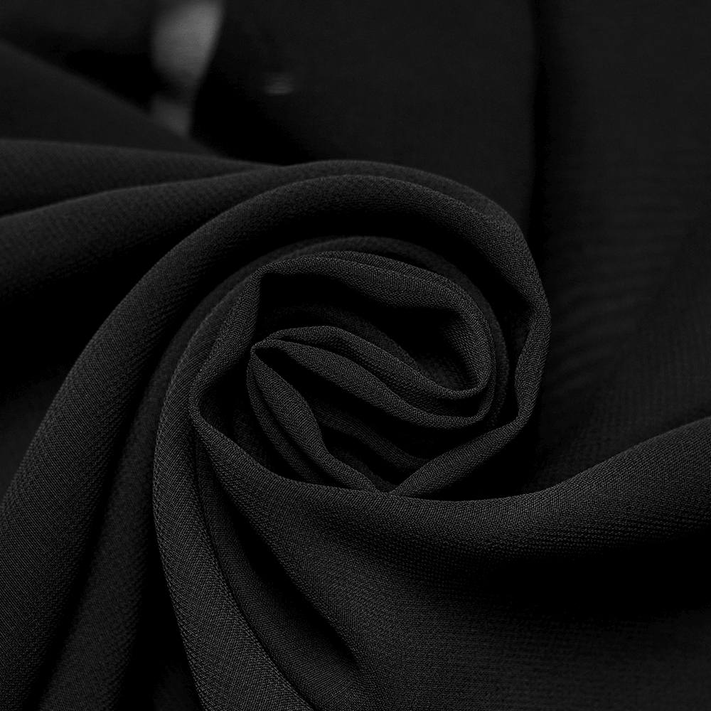 Close-up of black sheer chiffon fabric, showcasing its soft texture and elegant drape for gothic fashion.