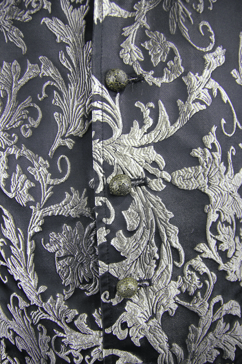 Close-up of a men's Gothic embroidered waistcoat showcasing intricate gold patterns and retro buttons.