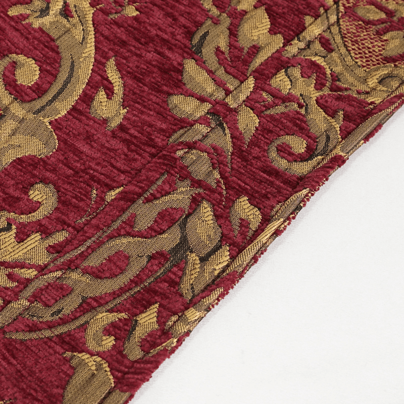 Intricate red and gold fabric showcasing ornate floral patterns, perfect for vintage gothic outerwear.