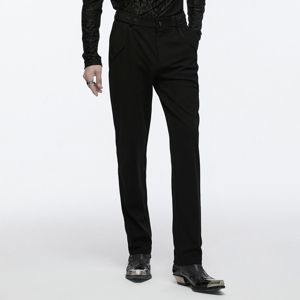 Men's gothic straight-leg trousers with retro buckles, styled elegantly with a sleek black shirt and shoes.