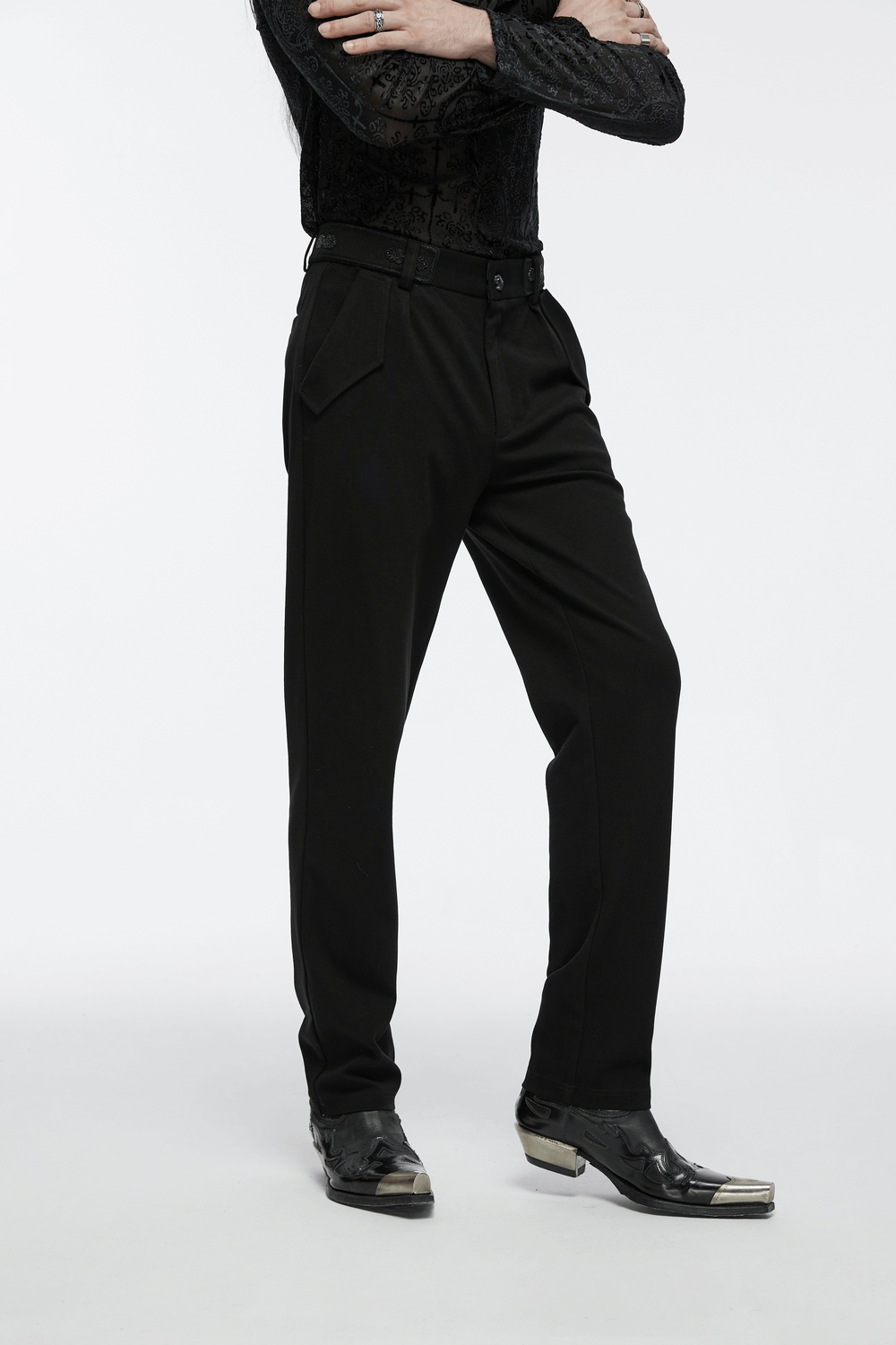 Men's gothic straight-leg trousers with retro buckles, styled with a black patterned shirt and unique shoes.