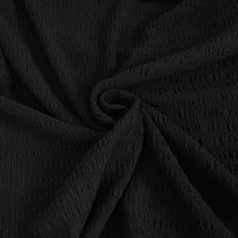 Close-up of textured black fabric ideal for gothic fashion, showcasing a rich, crinkled surface.