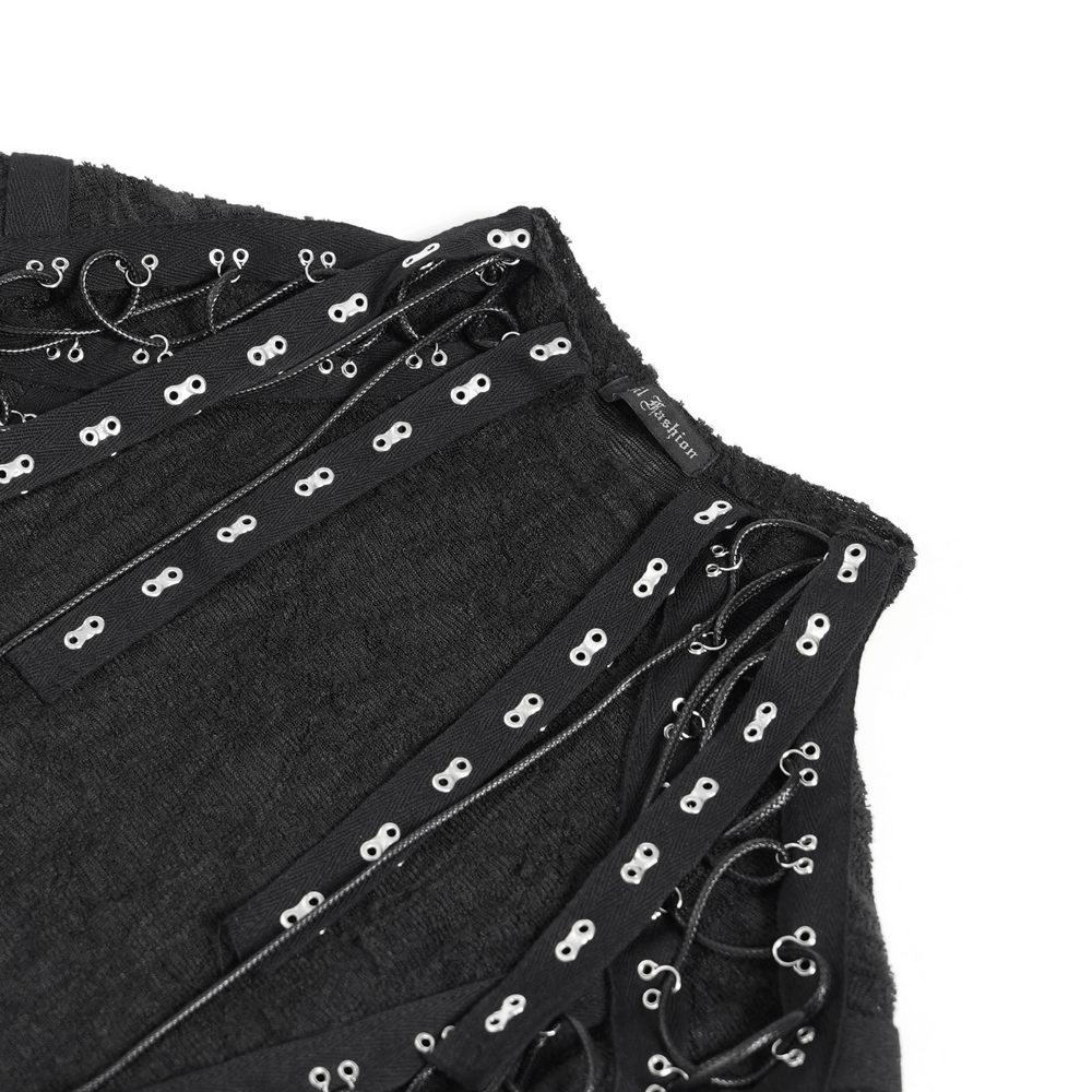 Close-up of black gothic top featuring cut-out sleeves and corset-style lacing details, perfect for punk fashion.