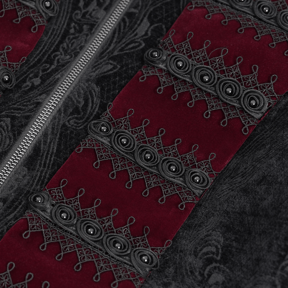 Close-up of intricate black and wine red velvet and brocade detailing on a men's Gothic tailcoat.