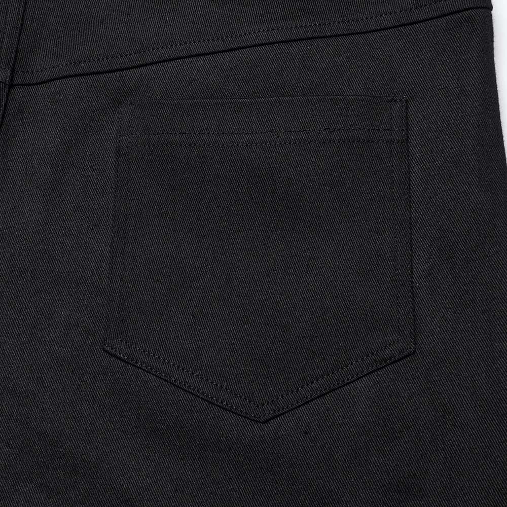 Detail of the back pocket on men's gothic twill pants, showcasing sleek black fabric and classic design.