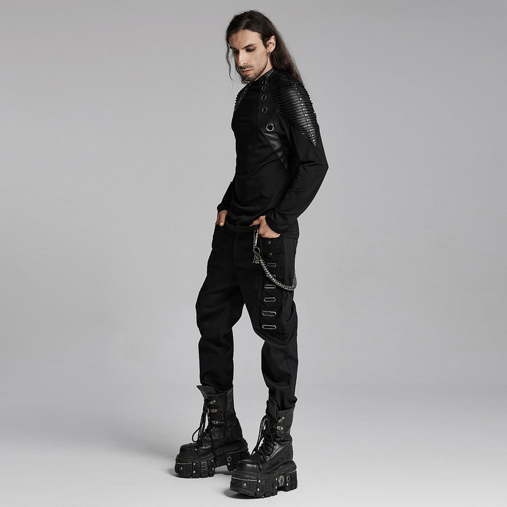 Men's gothic twill pants with eyelet details, paired with a stylish long-sleeve top and chunky boots, showcasing punk fashion.