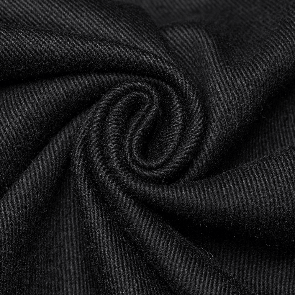 Close-up of durable black twill fabric showcasing its soft texture and intricate weave, ideal for gothic streetwear.