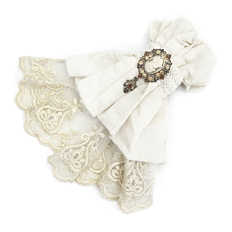 Elegant white cotton gothic tie with intricate lace and vintage brooch for alternative fashion.
