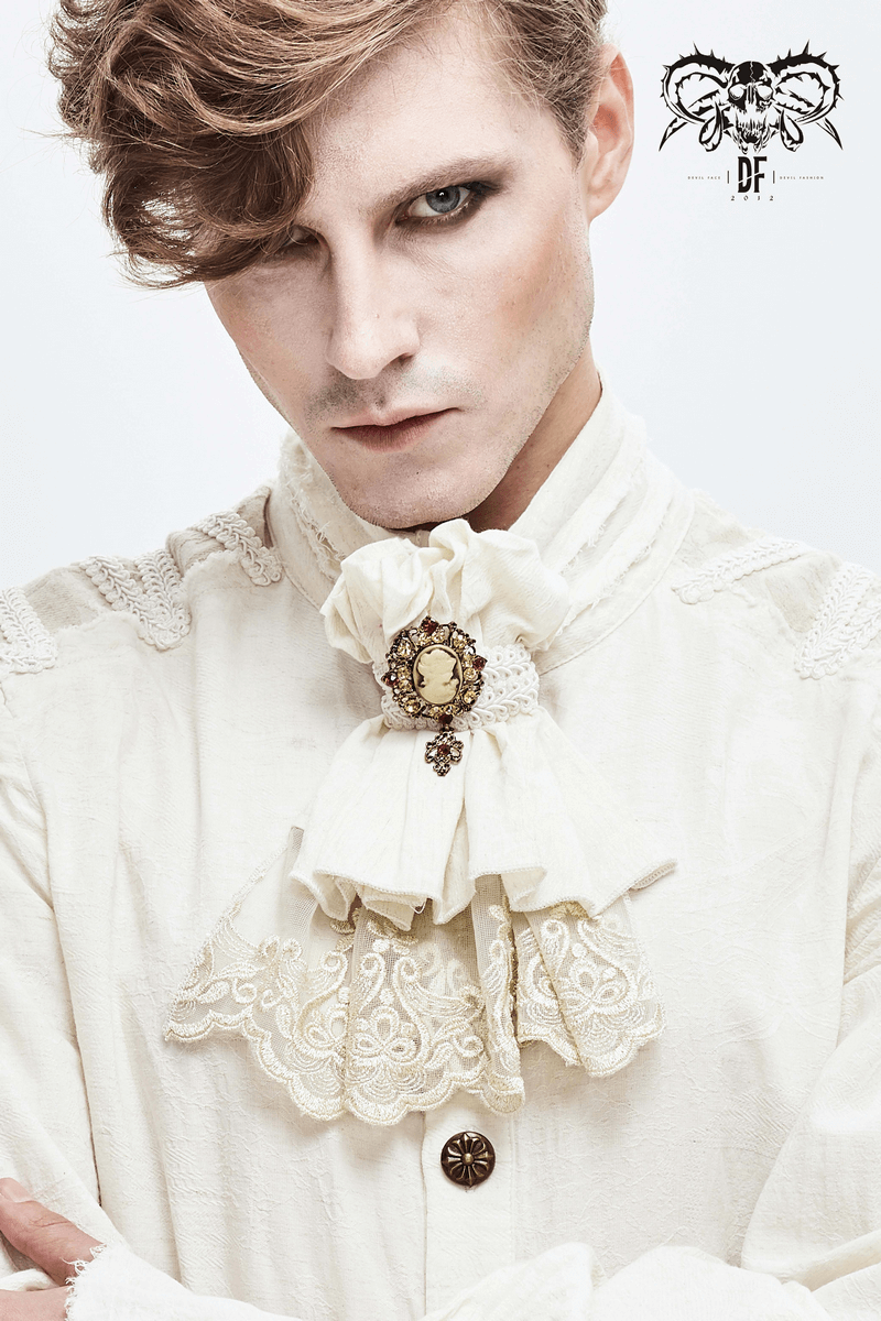 Men's gothic white cotton tie with vintage brooch, adding a retro flair to a stylish outfit.