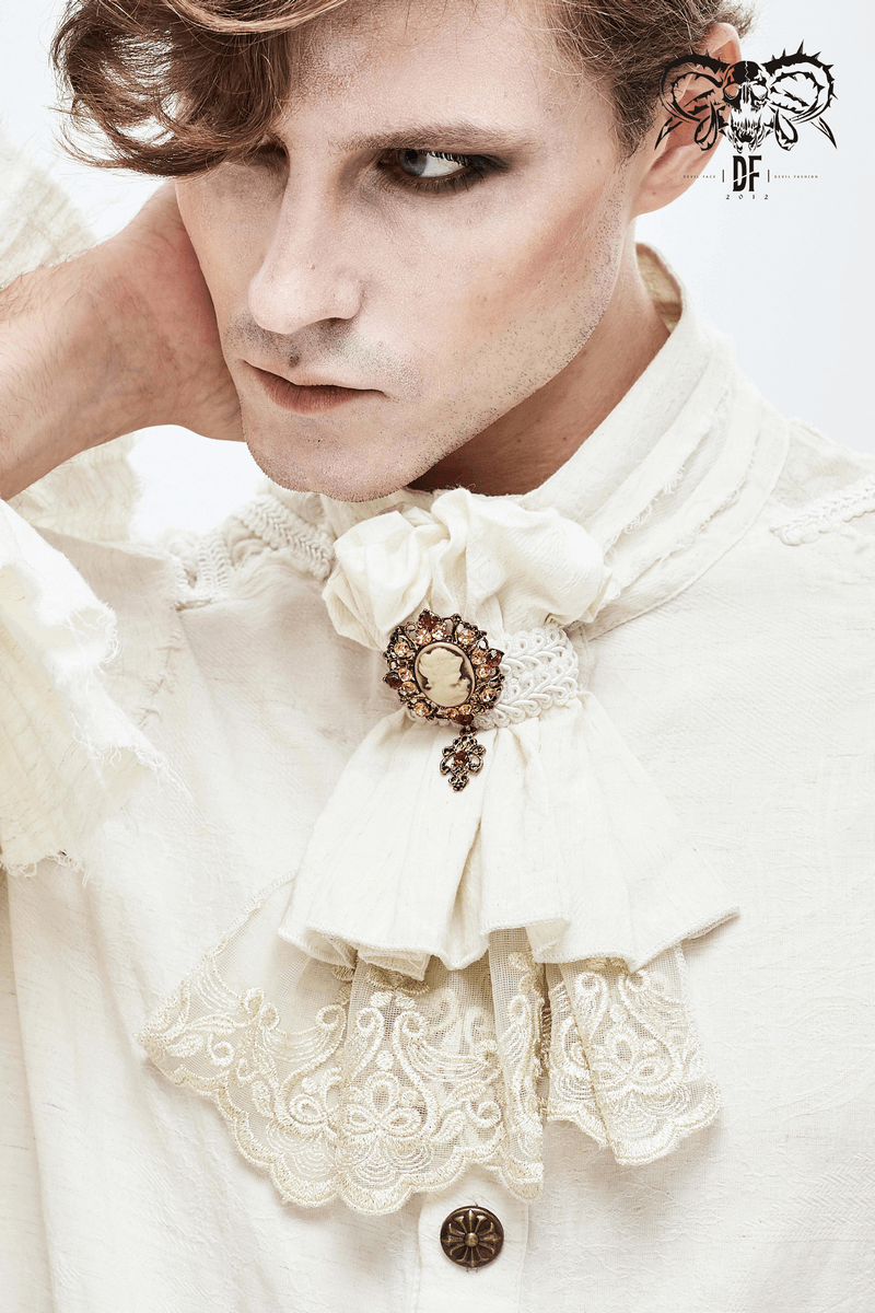 Elegant model showcasing a men's gothic white cotton tie with a vintage brooch accessory.