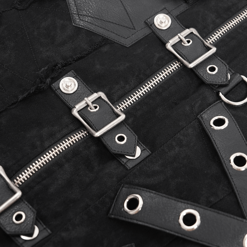 Close-up of men's gothic zipper vest with buckles, rings, and frayed edges, showcasing edgy punk rock style details.