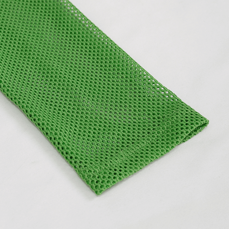 Close-up of a men's green mesh top sleeve, showcasing vibrant color and breathable fabric for stylish alternative wear.