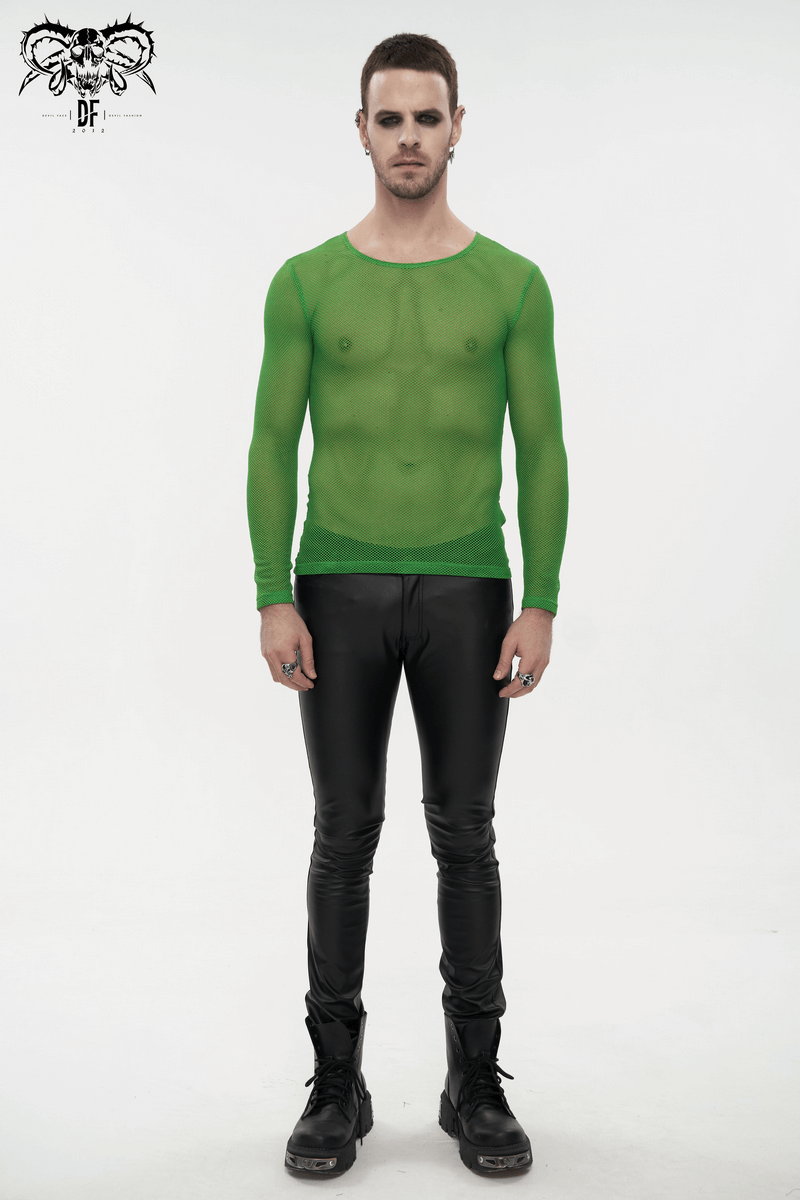 Stylish man wearing a green fluorescent long sleeve mesh top with black pants, showcasing alternative fashion.