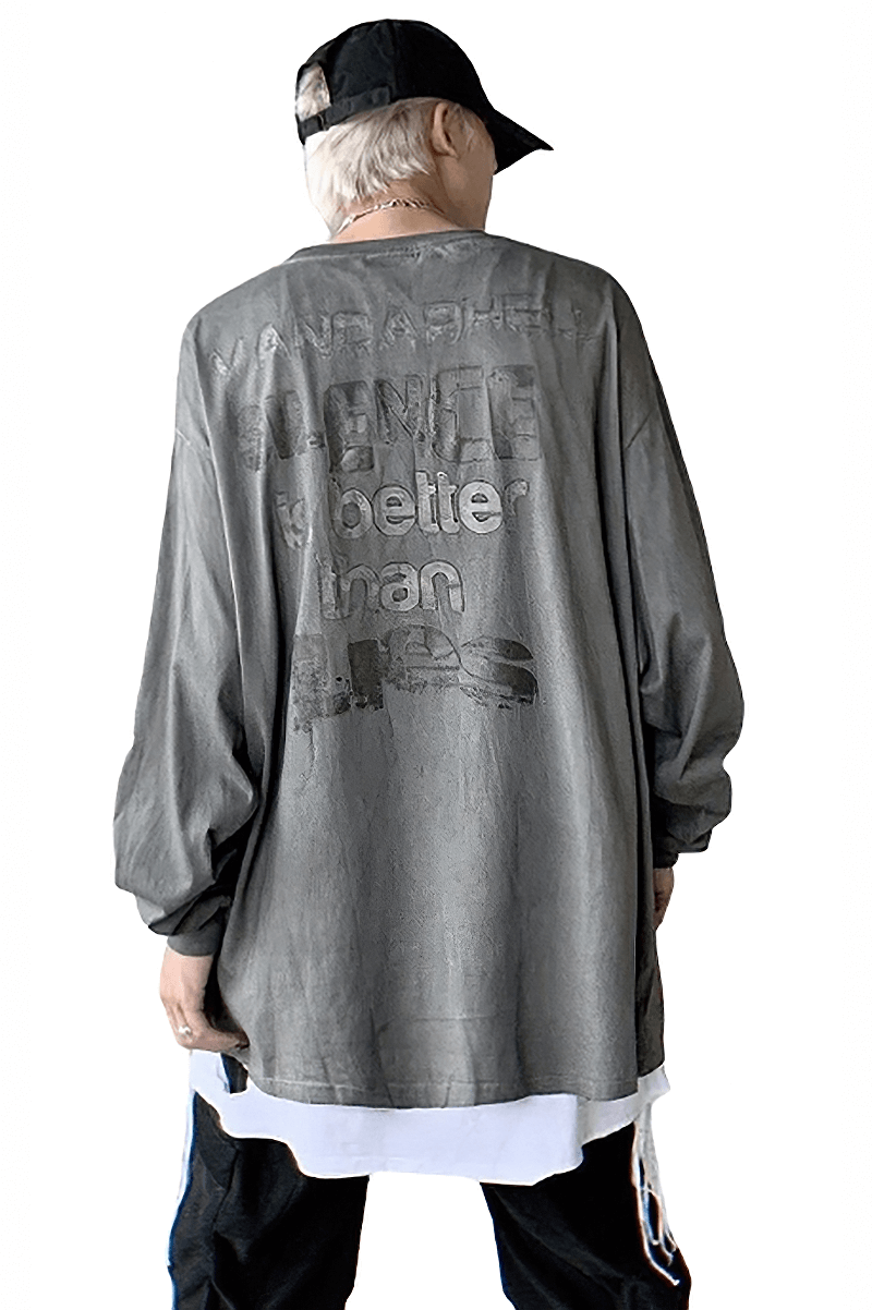 Men's oversized gray sweatshirt with graphic print, showcasing a trendy street style look.