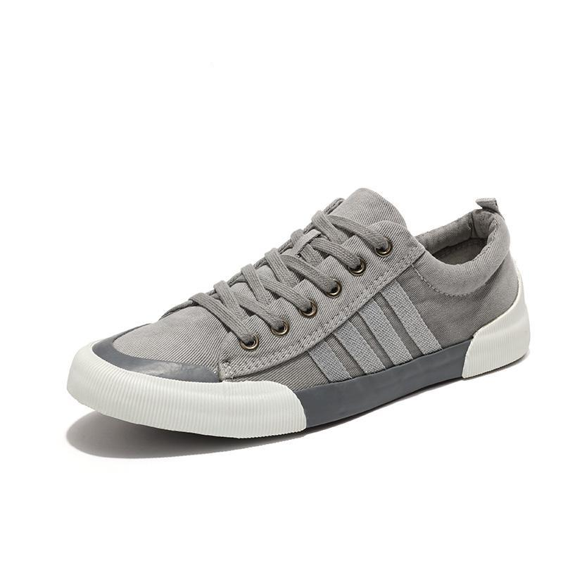 Stylish gray rock style breathable casual sneakers with round toe and lace-up design, perfect for men.