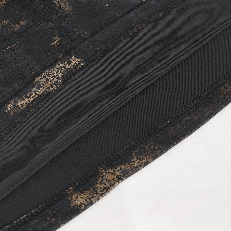 Close-up of men's punk tank top fabric showcasing black and gold pattern with unique texture and sturdy stitching.