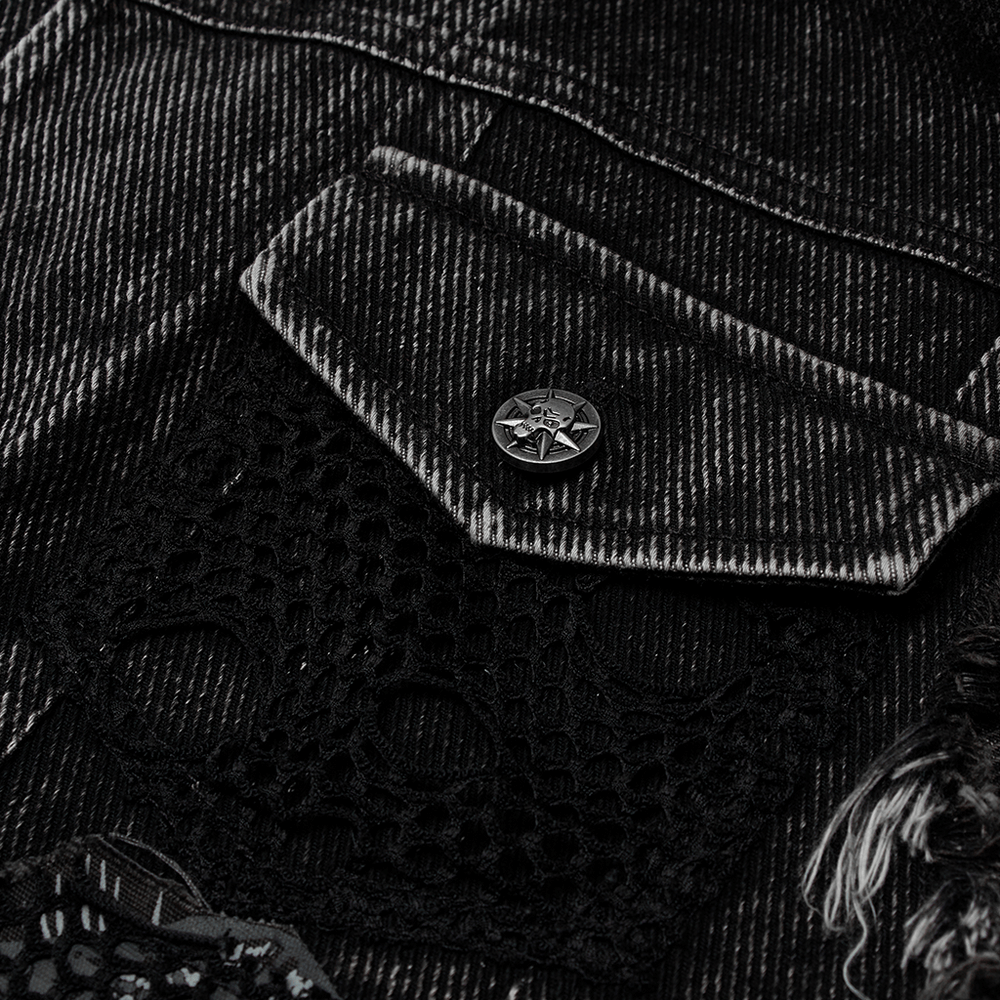 Close-up of a men's punk denim vest featuring a star button and black mesh patch for edgy style.