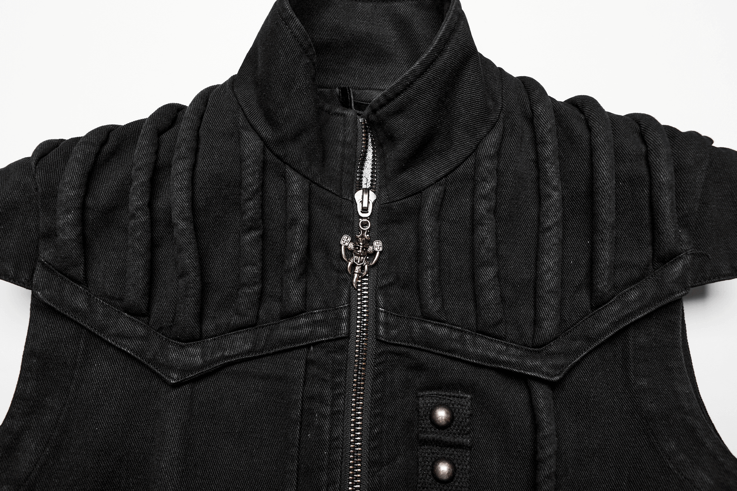 Black distressed denim vest with shoulder pads and zipper for a punk, gothic style look.