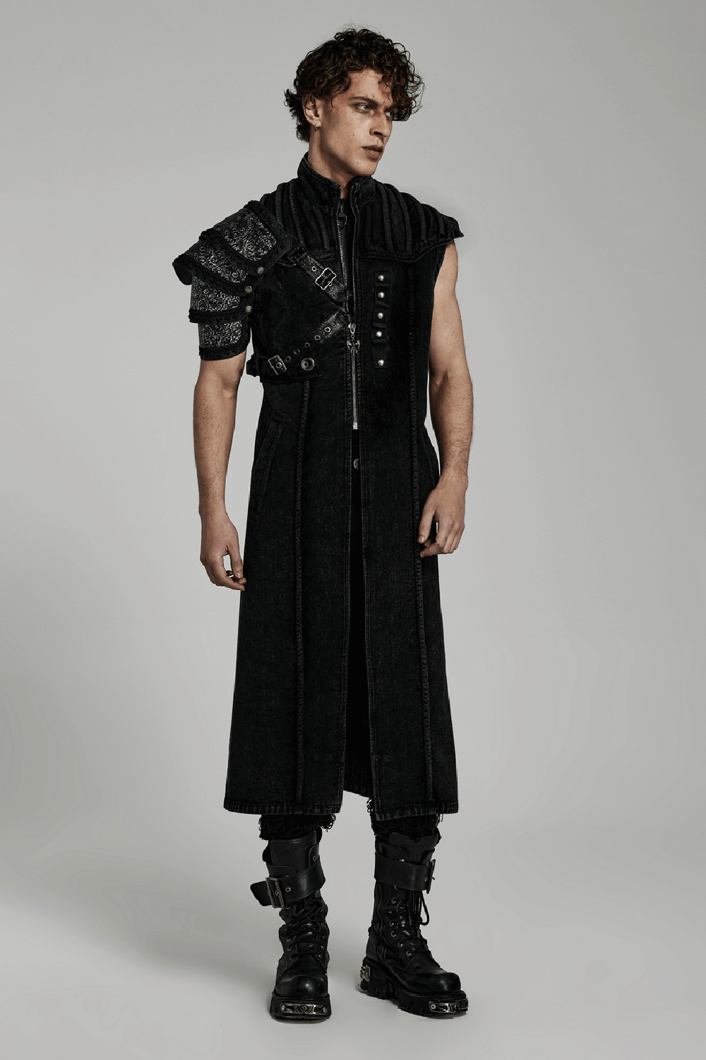 Men's black denim vest with rivets and shoulder pads, showcasing a punk gothic style.