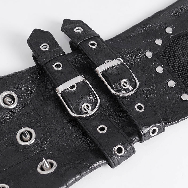 Close-up of men's rock style studded leather gloves with mesh and metal buckles for edgy fashion.
