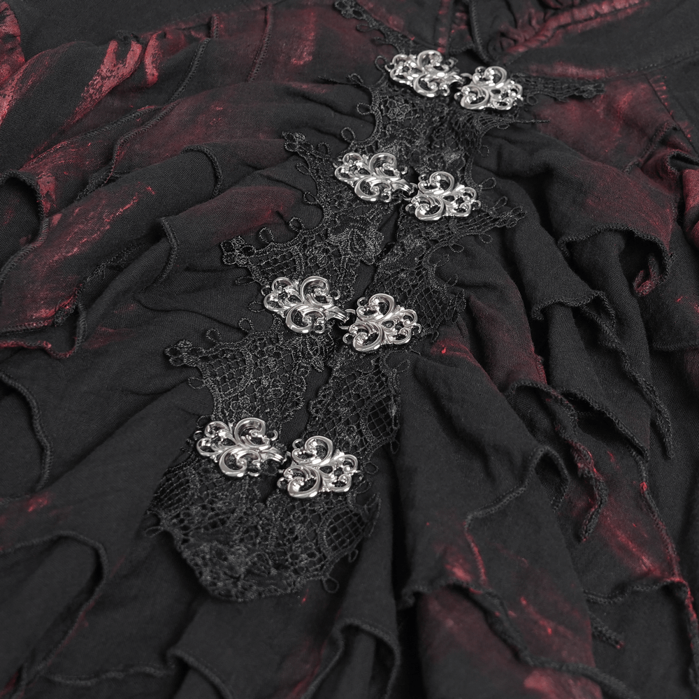 Close-up of Men's Ruffled Shirt with Silver Clasps and Tattered Sleeves showcasing ornate silver clasps and layered ruffles.