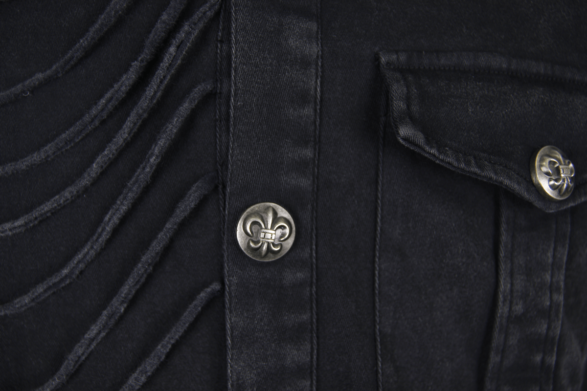 Close-up of men's black sleeveless shirt showing decorative silver buttons and gothic-style rivets.