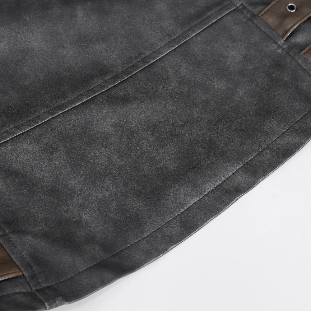 Close-up of the textured fabric of a Men's Spiked Leather Biker Vest showcasing durable leather details.