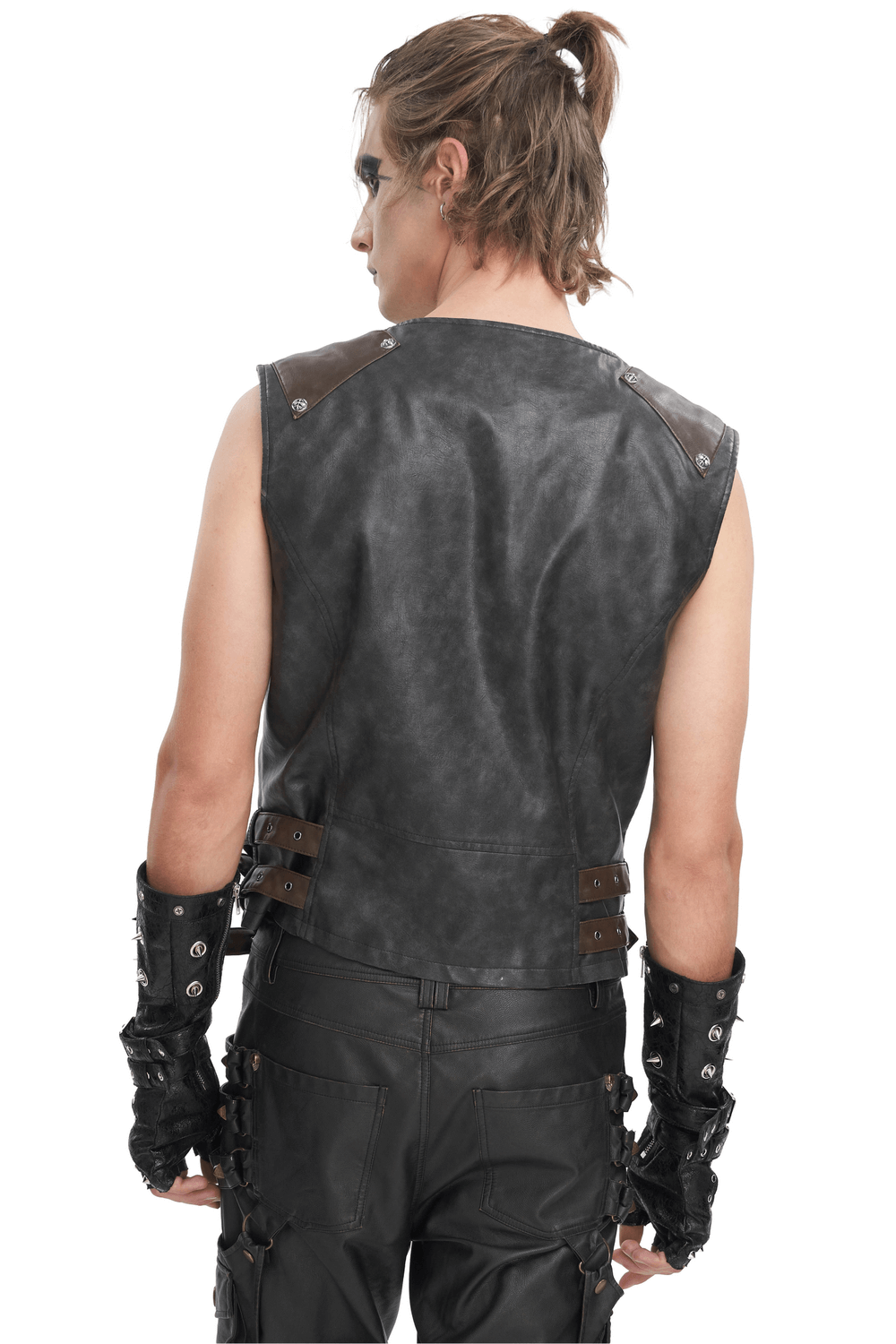 Rear view of a man in a spiked leather biker vest, showcasing edgy style and urban fashion.