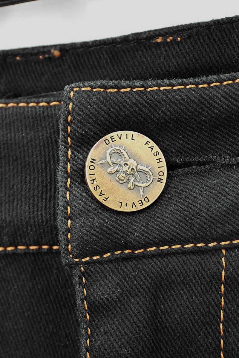 Close-up of a stylish button featuring "DEVIL FASHION" on men's punk pants, showcasing unique design details.