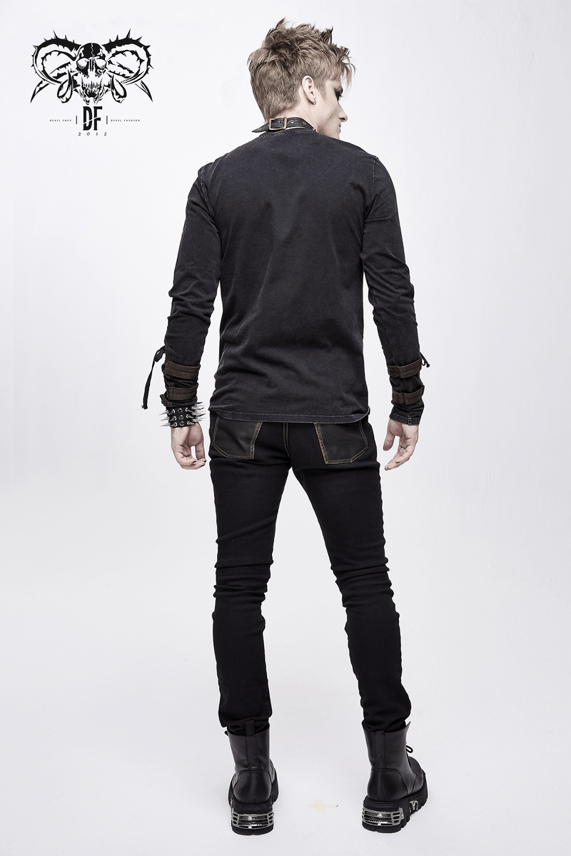 Model showcasing men's studded tight pants with dual buckle straps in a gothic style from the back.