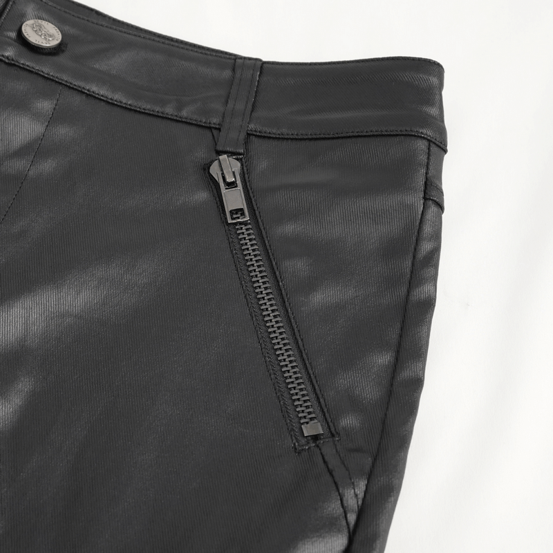 Close-up of stylish black leather biker pants zipper, showcasing sleek design and edgy metal accents.