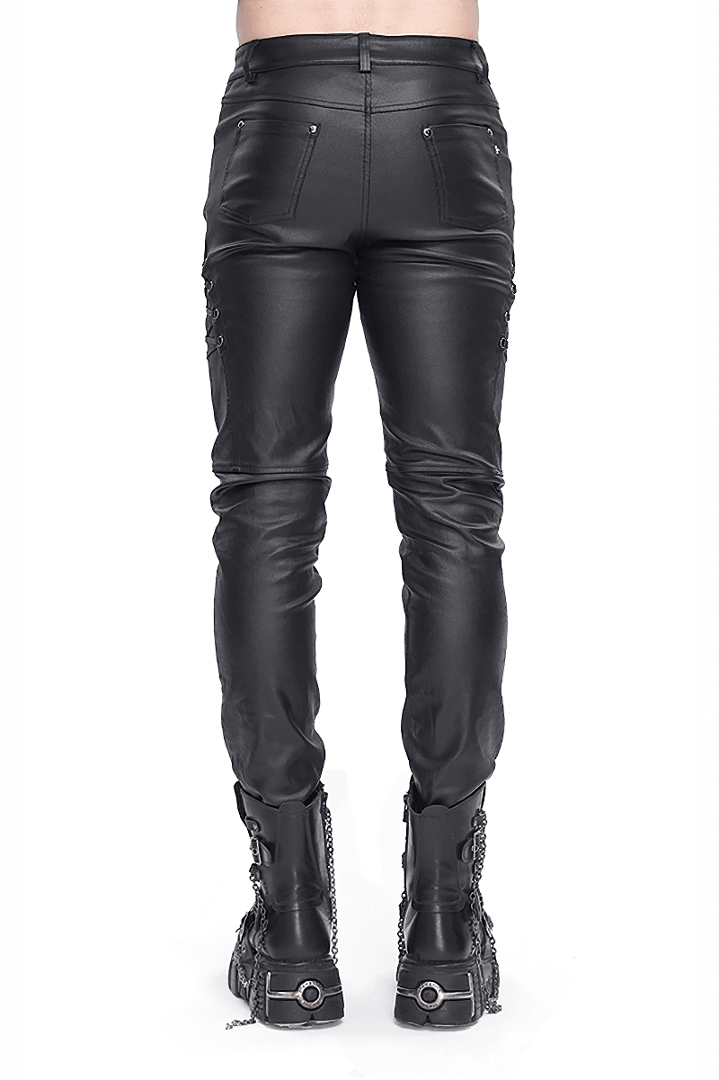 Men's stylish black leather biker pants viewed from the back, featuring sleek design and edgy metal accents.
