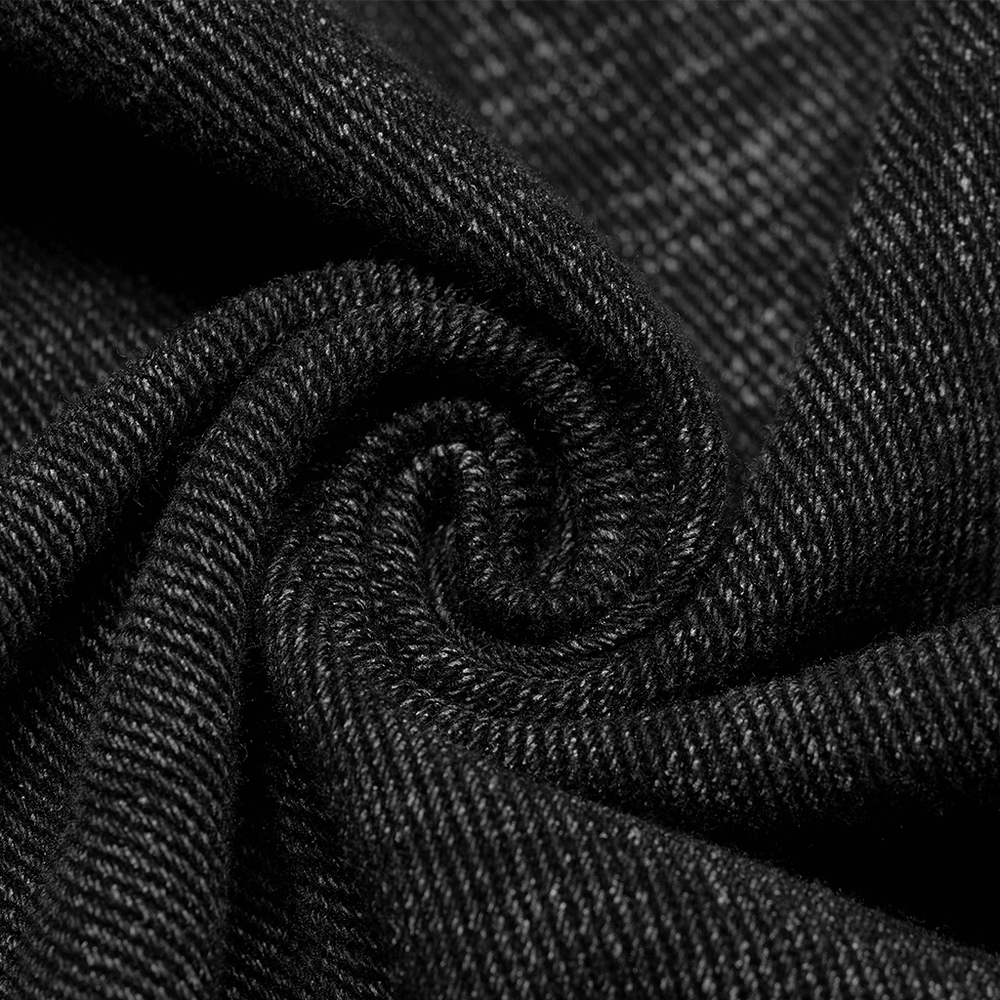 Close-up of dark textured fabric used in Men's Gothic Kilt, showcasing intricate patterns and rugged finish.