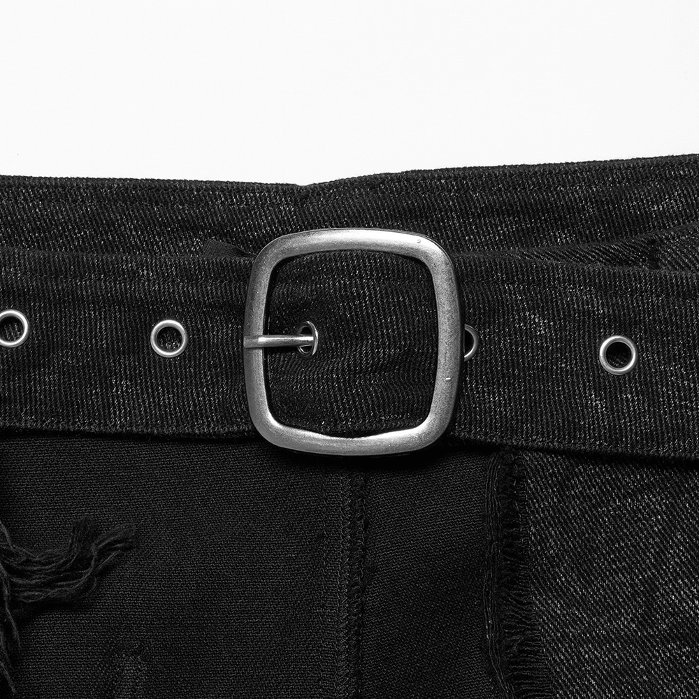 Close-up of adjustable belt on a textured black kilt, featuring metallic buckle and eyelets.