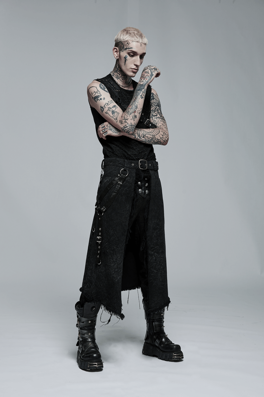 Men's textured gothic kilt with adjustable belt, paired with a sleeveless top and combat boots, showcasing a bold style.