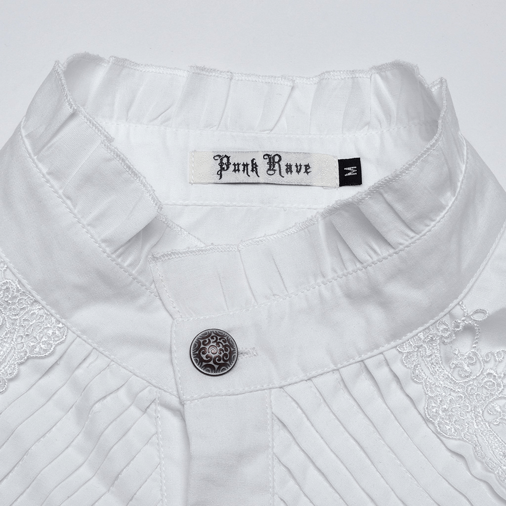 Close-up of a white Victorian shirt collar with ruffle edges and decorative button, featuring pleats and lace details.