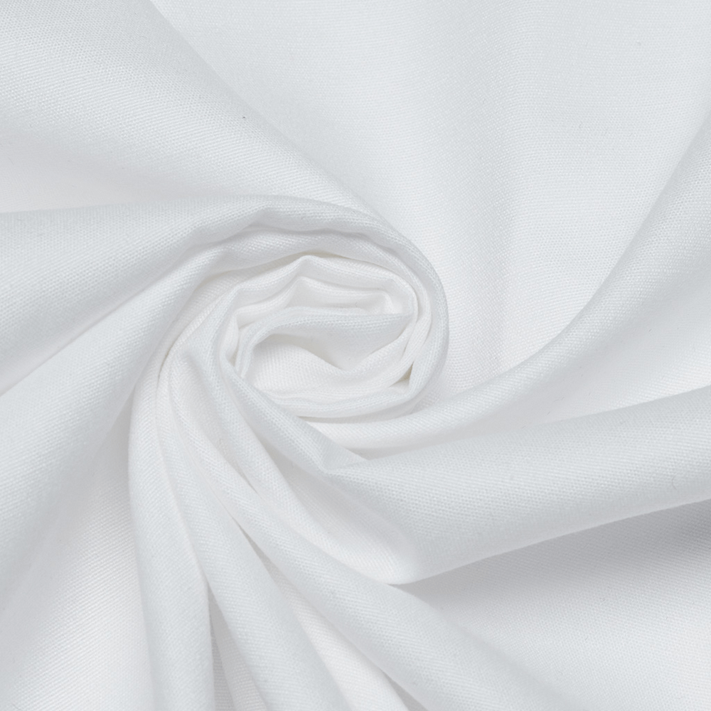 Close-up of pressed glossy textured white fabric, ideal for crafting a stylish Victorian shirt.