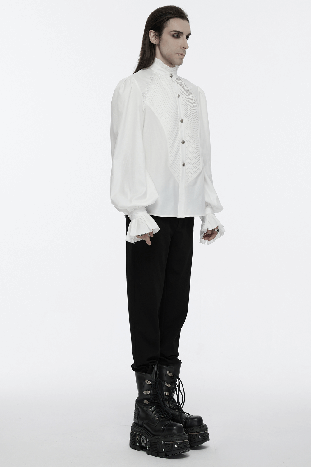 Men's Victorian shirt with ruffle collar, pleats, and bubble sleeves, styled with black pants and chunky boots.