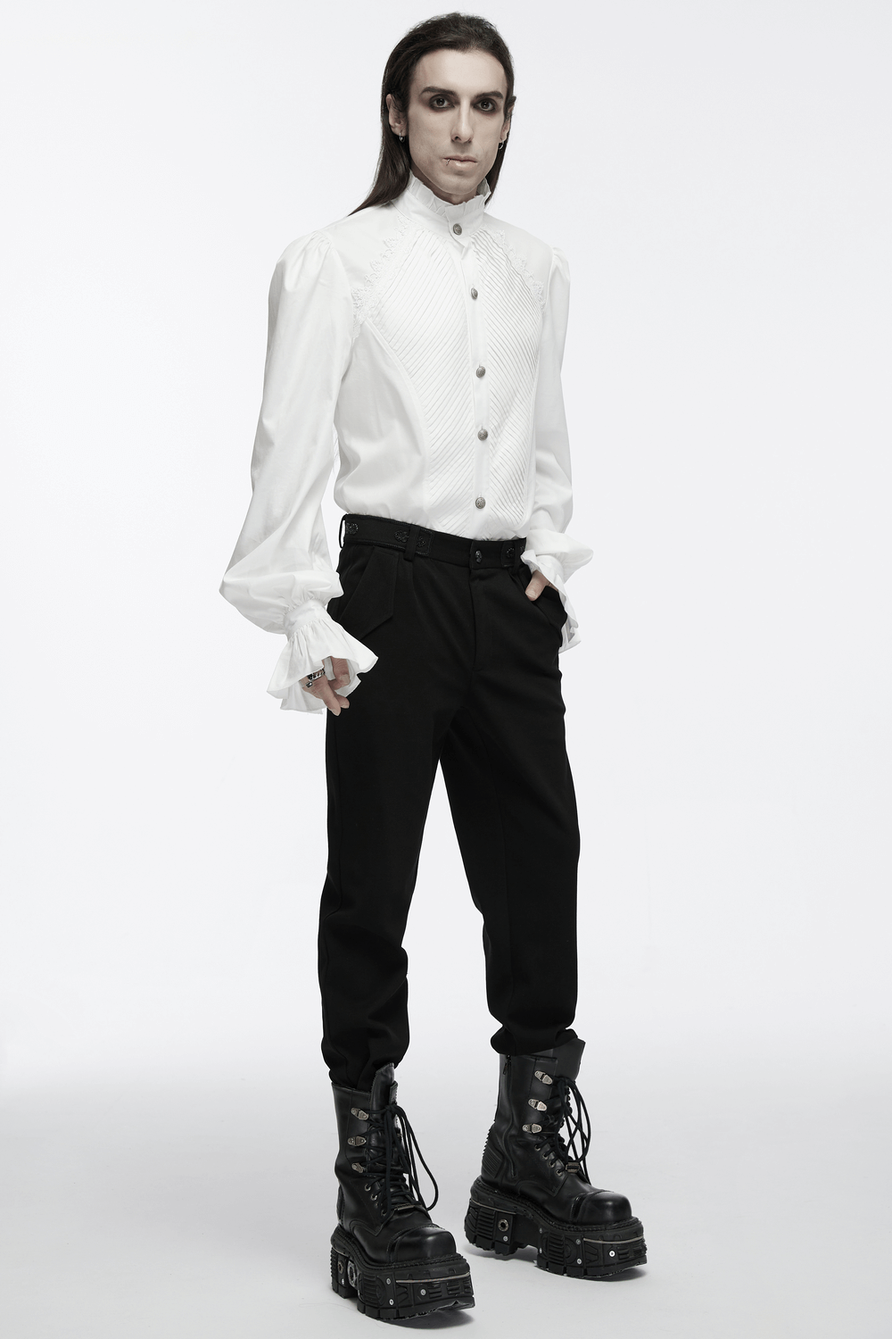 Men's Victorian shirt with ruffle collar and bubble sleeves, styled with black pants and chunky boots for a gothic look.