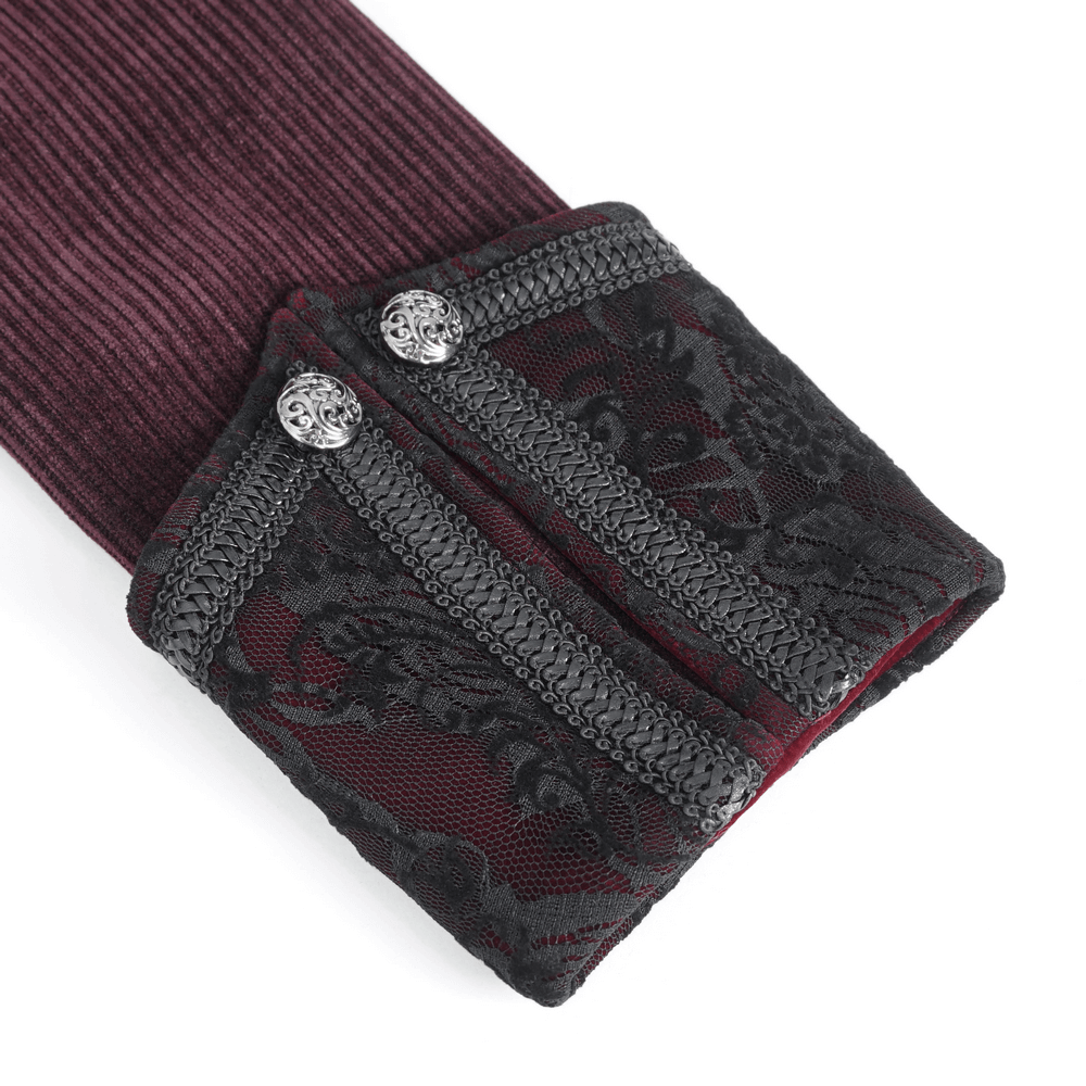 Close-up of intricate wine red Victorian coat cuff with black lace and chain detailing.