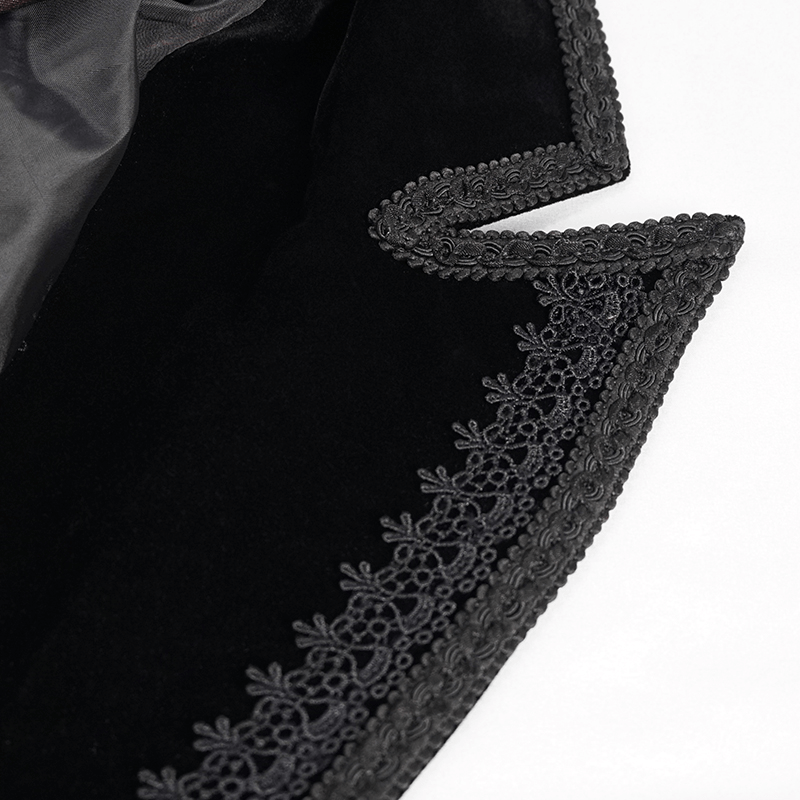 Close-up of intricate lace and velvet detailing on a gothic coat collar, showcasing elegant craftsmanship.