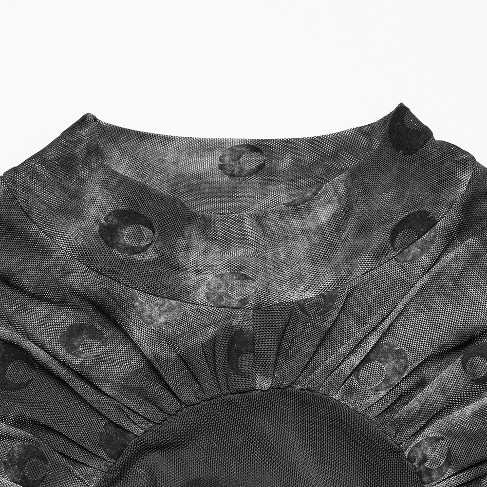 Close-up of mesh crescent print neckline showcasing sheer design and unique cut-out details.