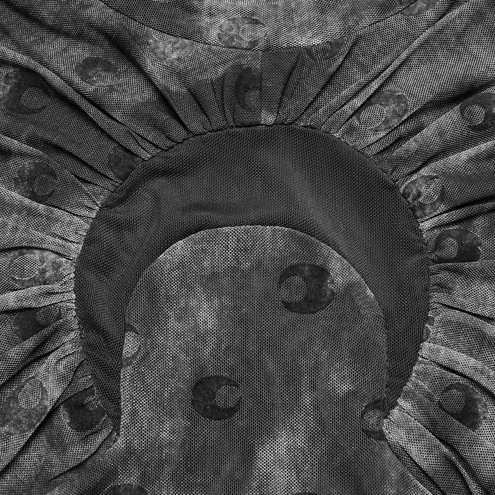 Close-up of the crescent print and sheer mesh design of a gothic long sleeve top.