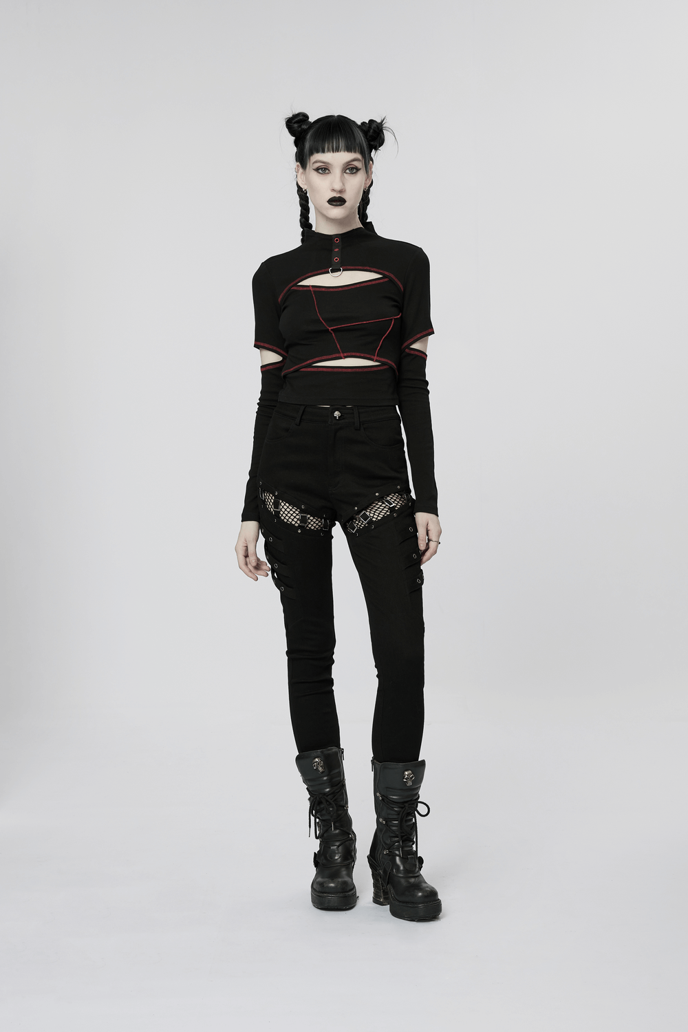 Model showcasing Mesh Panel Zigzag Buckle Skinny Punk Pants paired with a stylish black top and chunky boots.