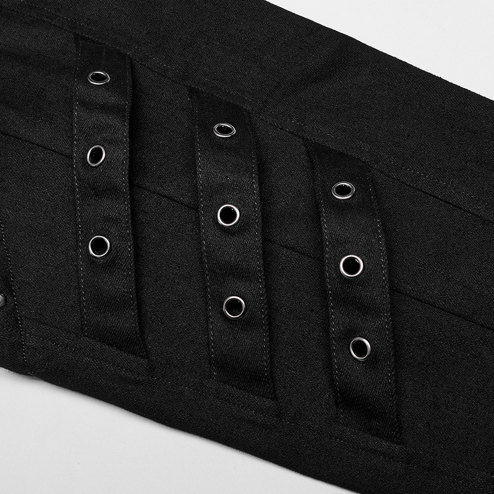 Close-up of zigzag buckles and eyelets on sleek punk skinny pants featuring mesh detailing.