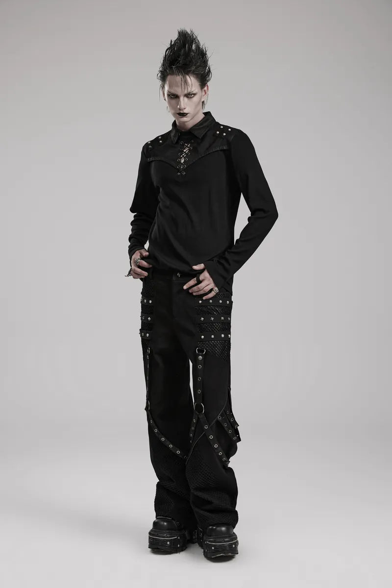 Gothic style model wearing punk wide-leg trousers with riveted mesh details and edgy accessories.