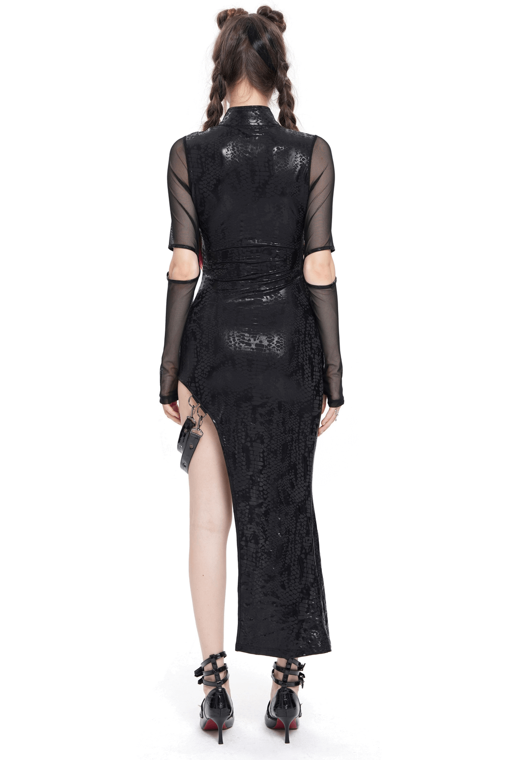 Back view of a gothic asymmetrical dress with sheer mesh sleeves, high slit, and snake-textured fabric.