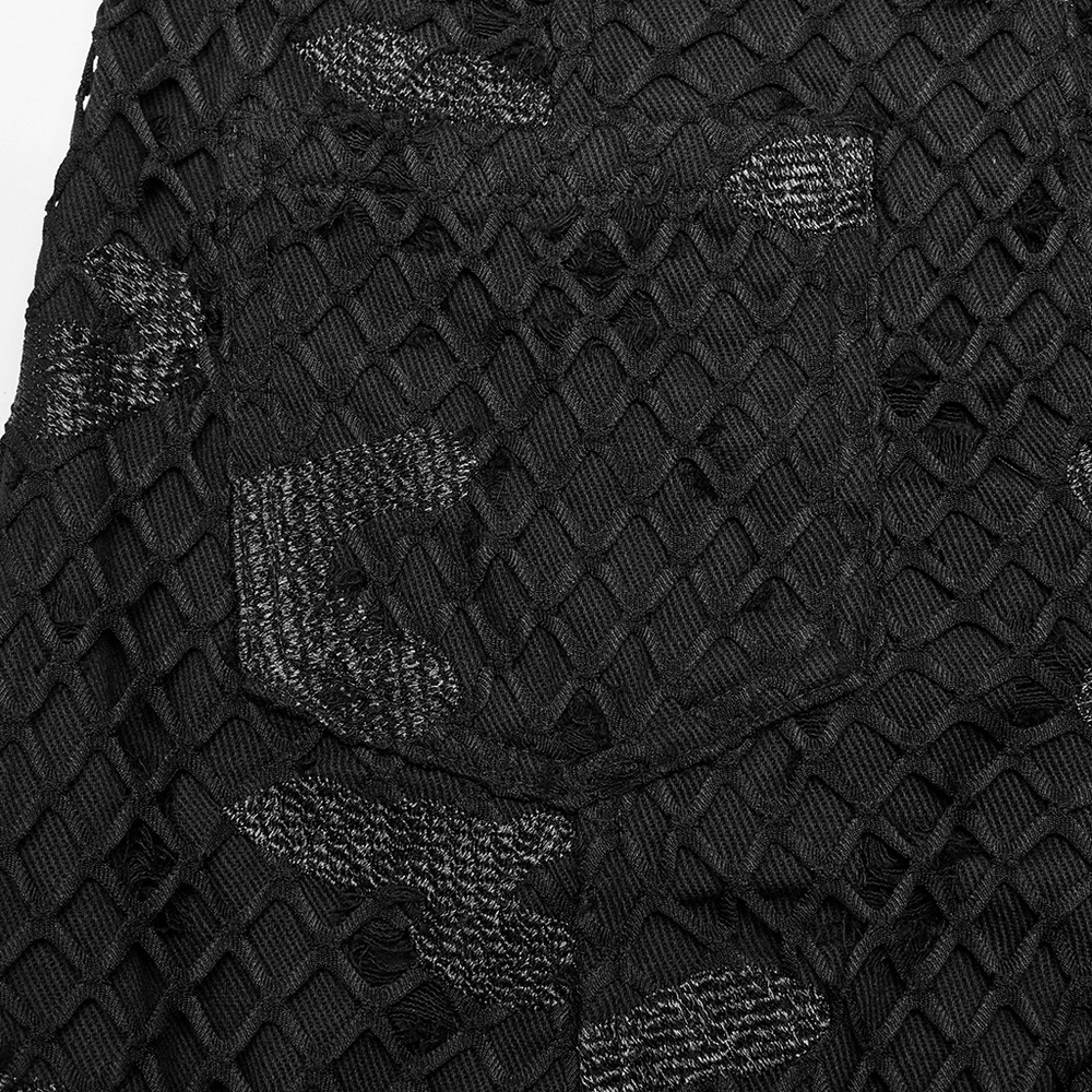 Close-up of black mesh twill fabric with textured details, perfect for edgy straight-leg pants.