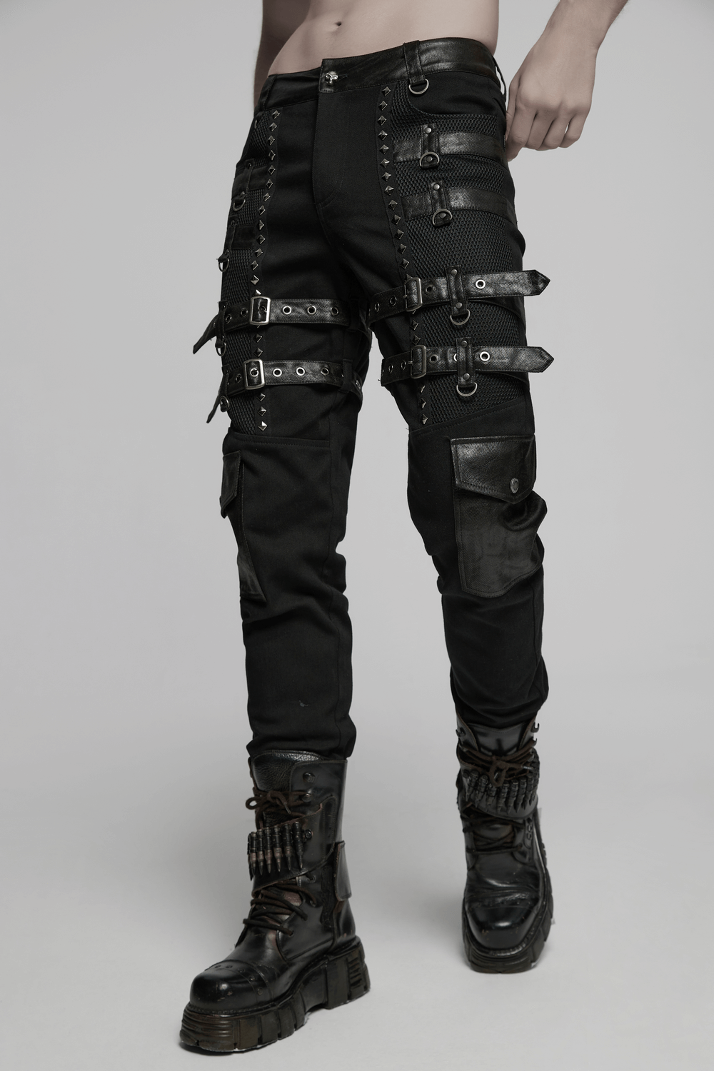 Metal punk stretch pants with studded straps, buckles, and mesh detail for edgy fashion.