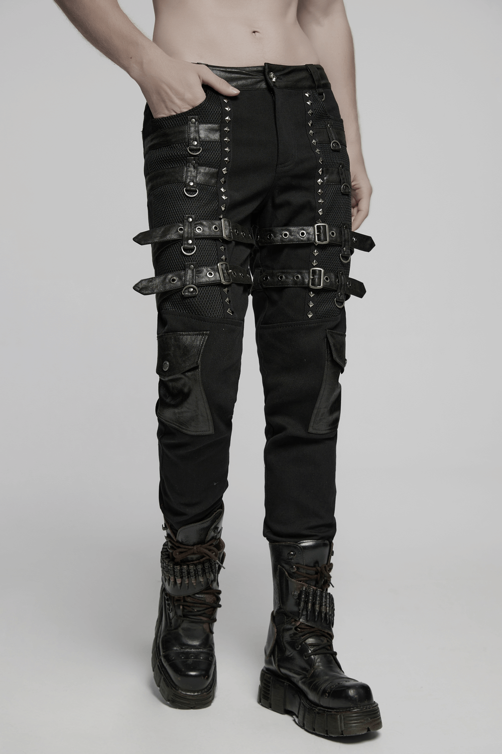 Metal punk stretch pants with studded straps, buckles, and mesh details for a bold fashion statement.